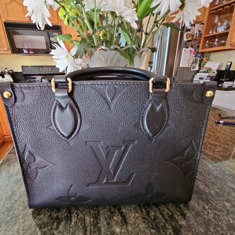 SOLD. Louis Vuitton On The Go PM
